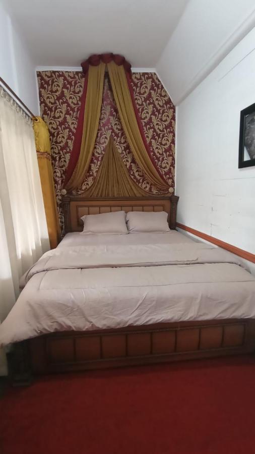 Rumah Gadang Simarasok Baso Bagian luar foto