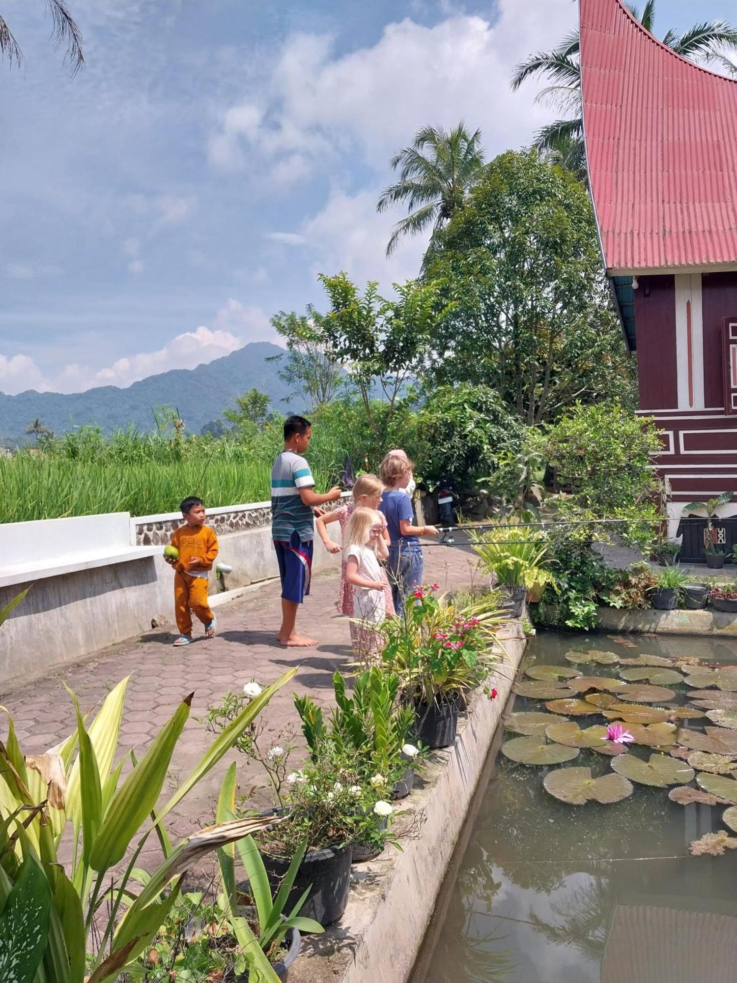 Rumah Gadang Simarasok Baso Bagian luar foto